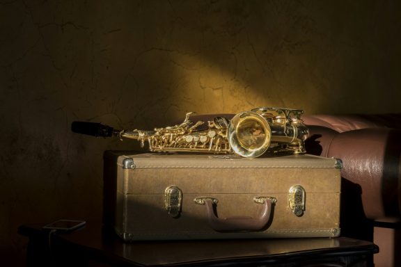 Soprano Saxophone Curved soprano saxophone lying on its case